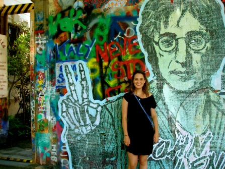 Posing in front of the Lennon Wall in Prague, Czech Repubic.